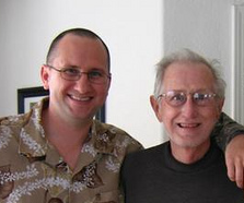 Travis and his dad Bob (and his brother AJ in the full-size image)